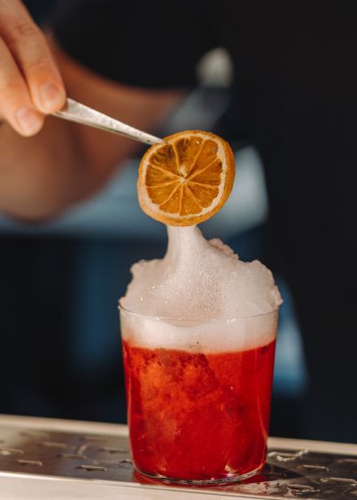 Bartender preparing a craft cocktail at Pi Bar, highlighted in Luma Creative’s San Francisco social media marketing project